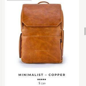 Atlas Supply’s Minimalist Leather Backpack in copper color, original design.